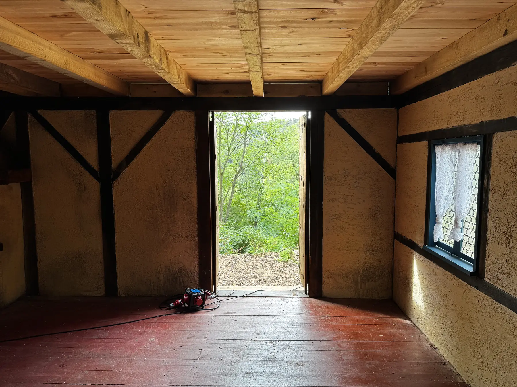 Ground-floor room with practical exterior doorway